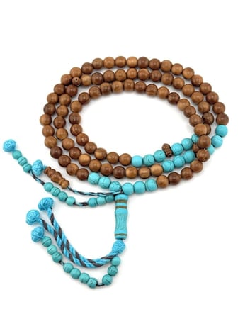 سبحة خشب جوز الكوك المطعم بالفيروز