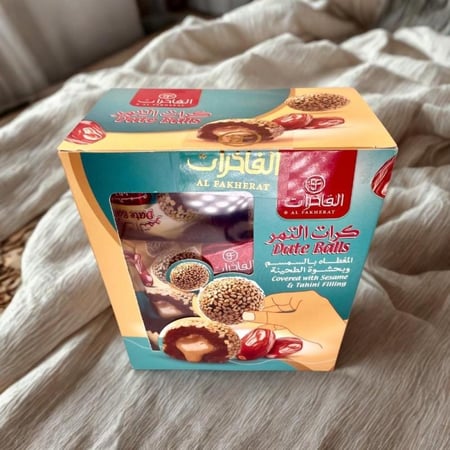 كرات التمر المغطاه بالسمسم والطحينة 190جم - من الفاخرات
