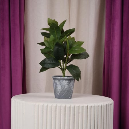 شجر زينة صناعي صغير اخضر