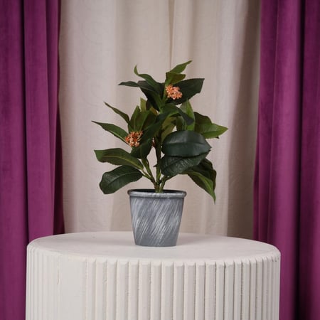 شجر زينة صناعي صغير اخضر