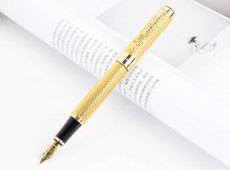 قلم بالحبر السائل للجنسين مغطى باللون الذهبي