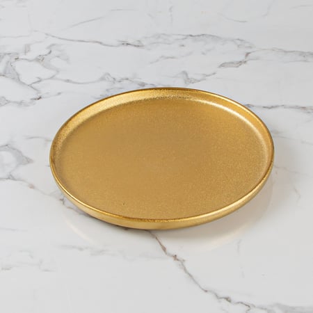 طبق تقديم ذهبي