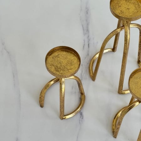 حامل شمع ذهبي متجر غصون وشجون