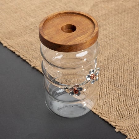 علبة زجاج بغطاء خشب