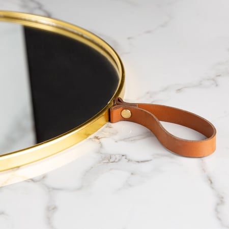 مراية ديكور بإطار ذهبي