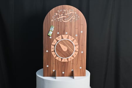 عجلة الحظ  بي عبارة (عيد سعيد) كرتوني مقاس30*50سم