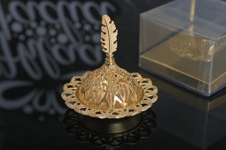 مجموعه (12) راس مبخرة لون ذهبي بي علبة شفاف