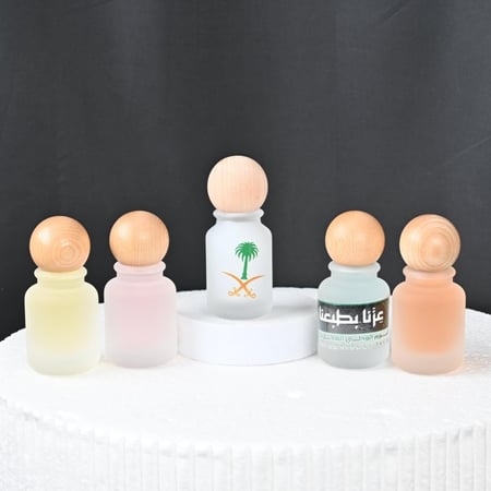 مجموعه(12) عطورات بغطاء خشبي بدون طباعه