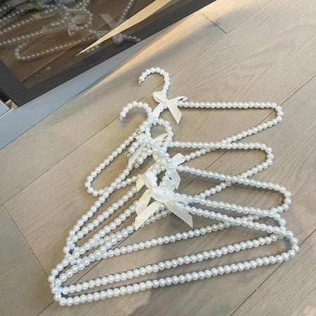 مجموعة (12) علاقة ملابس لؤلؤي ابيض