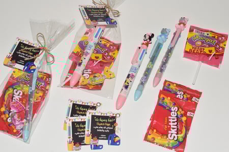 توزيعات للعودة للمدارس ( قلم )