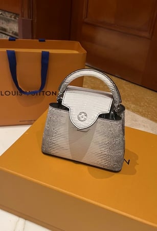 LV capucines lizard skin