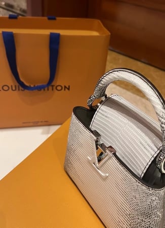 LV capucines lizard skin