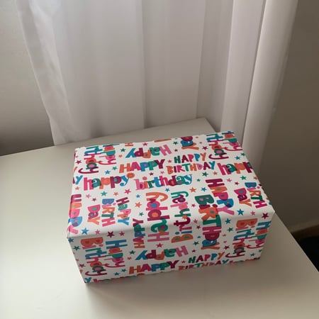 خدمة تغليف مشترياتك كهدية- مع بطاقة بريدية