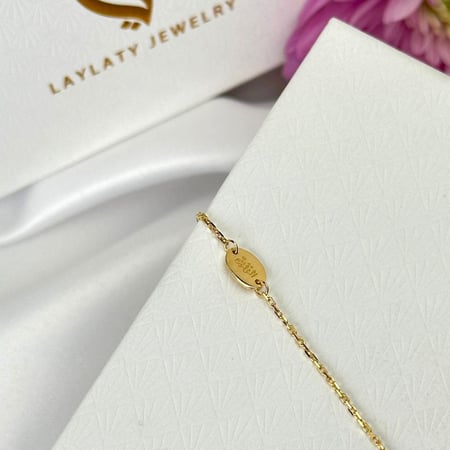 عقد اغسطس زهرة الزنبق ذهب عيار21