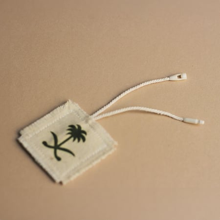 تعليقة سيفين ونخلة