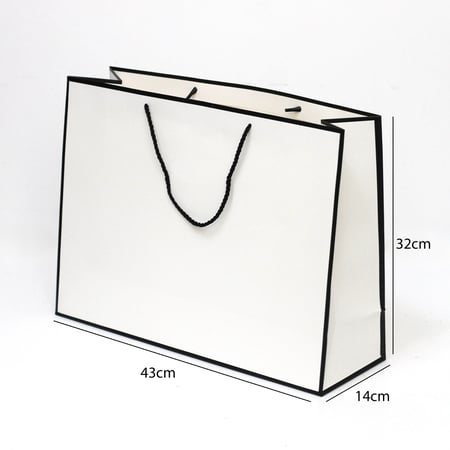 أكياس هدايا ورقية فاخرة بحواف سوداء