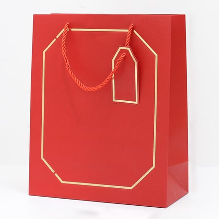 أكياس هدايا بإطار ذهبي