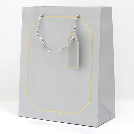 أكياس هدايا بإطار ذهبي