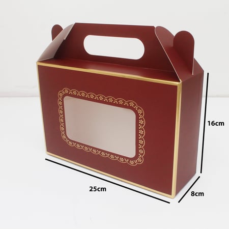 علب ورقية بيد عودي ذهبي