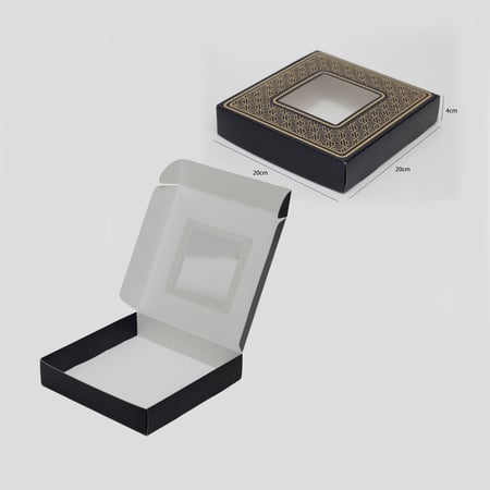 علب ورقية مزخرفة بتصاميم ذهبية