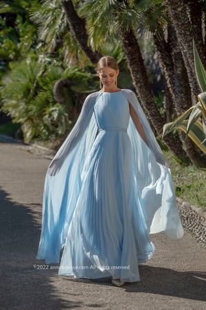 Pale Blue Pleated Dramatic Cape-Sleeve Gown