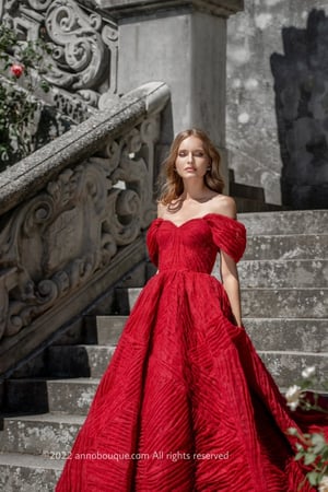 ‏  Off-shoulder gown with Puffy skirt