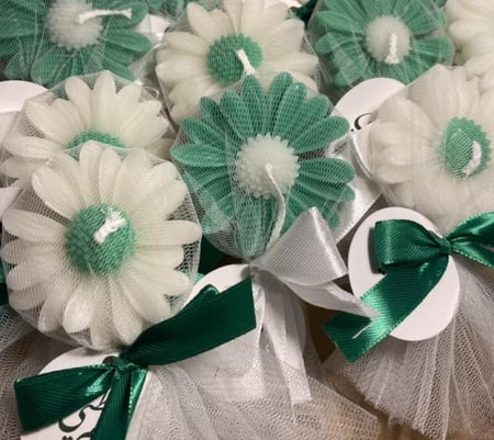 توزيعات شمعة البابونج لليوم الوطني