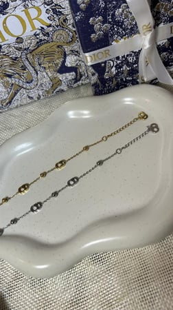 إسوارة Christian Dior فضي - ذهبي