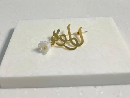 بروش أطفال فاخر مطلي بالذهب