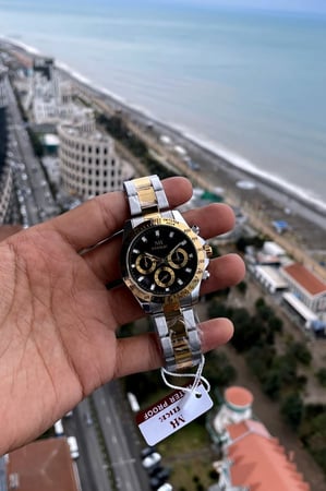 ساعة فضي وذهبي