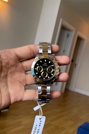 ساعة فضي وذهبي