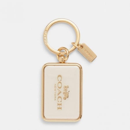 ميدالية كوتش ابيض ذهبي