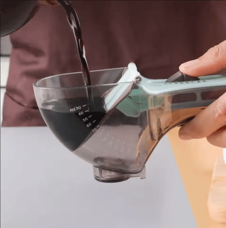 ملعقة القياس المتحرك