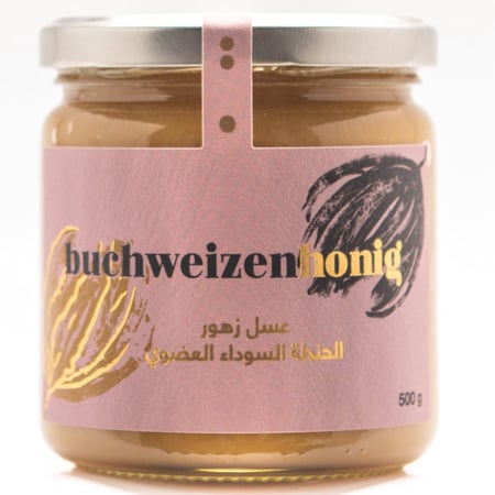عسل زهور الحنطة السوداء العضوي