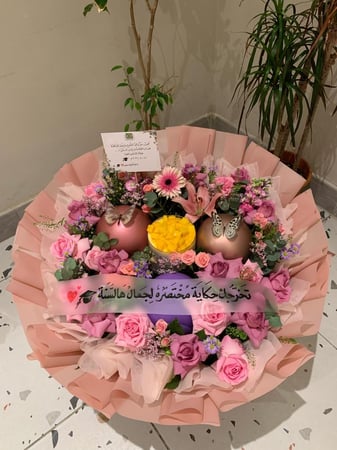 باقة ورد تخرج  مع كيك