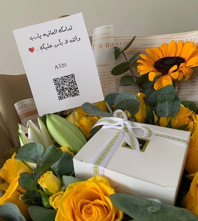 باقة ورد بالاضافه الى شوكلاتة باتشي