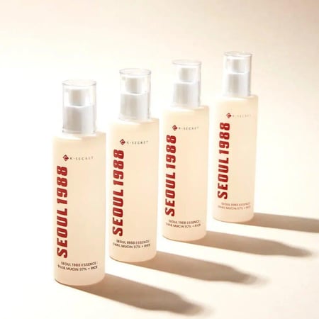 إيسنس كي سيكريت سيول بمخاط الحلزون 97% والأرز 100 مل - K-Secret Seoul 1988 Snail Mucin 97% + Rice Essence 100ml