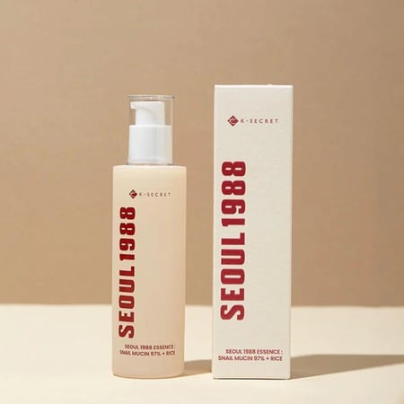 إيسنس كي سيكريت سيول بمخاط الحلزون 97% والأرز 100 مل - K-Secret Seoul 1988 Snail Mucin 97% + Rice Essence 100ml