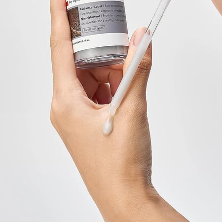 أمبول تقشير الأرز الأسود لإزالة الرؤوس السوداء والإشراقة من دكتور ميلاكسين - 80 مل