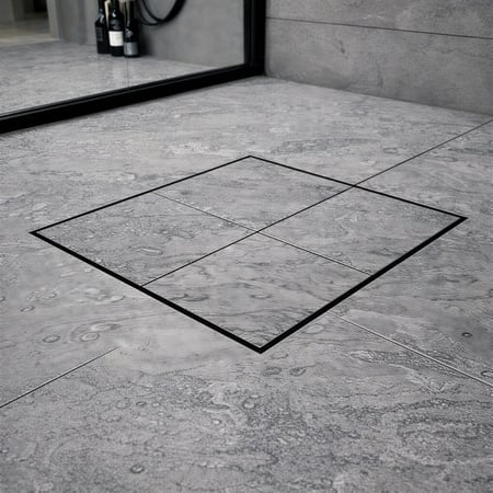 صفاية بلاط سوداء مخفية مدمجة مع أرضية حمام مودرن بتصميم نحيف وأنيق