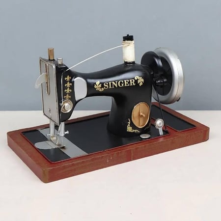 ديكور ماكينة خياطة حديد انتك