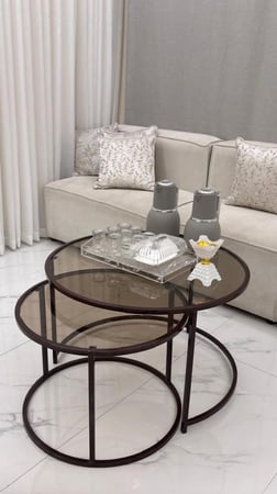 طقم طاولتين شمباني بسطح زجاج بني شفاف أنيق