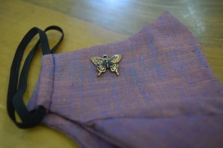 اضافة اكسسوار معدني للكمامة