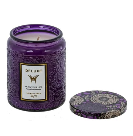 شموع معطرة في أوعية زجاجية