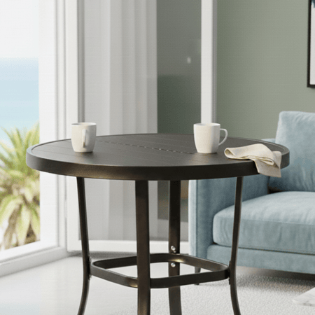 طاولة مفردة دائرية بأرجل معدنية أسود