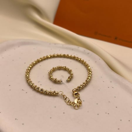 سوارة وخاتم عيار 18