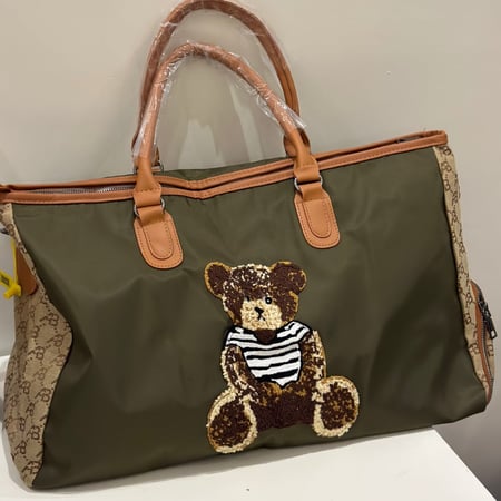 شنطة لون جيشي متعددة الاستخدامات