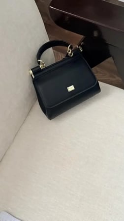شنطه دوتشي اسود
