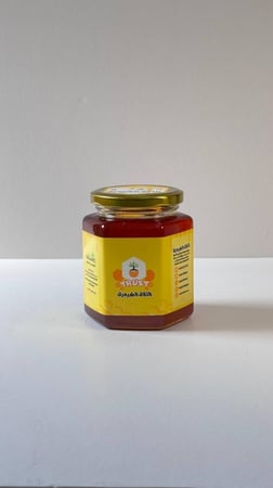 عسل زهور . نصف كيلو