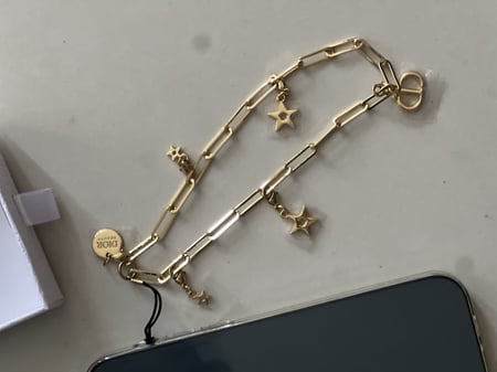 تعليقة للجوال dior